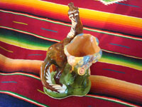 Mexican vintage pottery and ceramics, a prancing horse with attached bowl, Tlaquepaque, c. 1930. A photo shot from behind the horse.