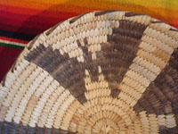Native American Indian basket, a lovely Papago basketry tray with bats, c. 1930-40. Closeup photo of the bats decorating the Indian basket.