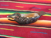 Native American Indian wood-carving and folk art, a Northwest Coast carved grease-bowl in the form of a raven, c. 1910-20. The raven bowl is beautifully carved and is wonderfully inlaid with pieces of abalone shell. Main photo.