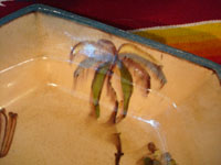 Mexican vintage pottery and ceramics, a beautiful six-sided bowl from Tlaquepaque, Jalisco, c. 1920-30. Closeup photo of one corner of the bowl.