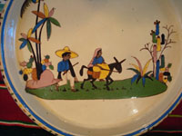 Mexican vintage pottery and ceramics, a large charger from Tlaquepaque, Jalisco, c. 1920-30. Closeup photo.