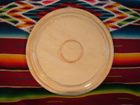 Mexican vintage pottery and ceramics, a large charger from Tlaquepaque, Jalisco, c. 1920-30. Photo showing the back side of the charger.