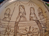 Mexican pottery and ceramics, a wonderful charger from Tzintzuntzan, Michoacan, on the shores of Lake Patzcuaro, c. 1990. Closeup of the women fishing.