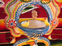 Mexican vintage pottery and ceramics, and Mexican vintage folk art, a beautiful "tree of life" candleabra with birds and a wonderful tucan, c. 1960's. Closeup photo of the bowl at the center of the tree of life.
