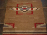 New Mexican vintage serapes and textiles, and Chimayo vintage textiles, a very beautiful Chimayo woven textile with a lovely brown background and fine decorative elements, Chimayo, Northern New Mexico, c. 1940. Photo showing the center part of the Chimayo textile.