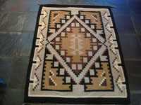 Native American Indian textiles, and Navajo vintage textiles and rugs, a lovely Two Grey Hills textile with beautiful colors and very fine hand-carted wool in natural colors, Arizona or New Mexico, c. 1950's. Main photo of the Navajo rug.