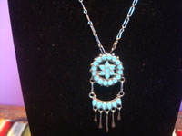 Native American vintage sterling silver jewelry, a beautiful Zuni necklace, silver and turquoise petit-point, Zuni Pueblo, New Mexico, c. 1940's. Closeup photo of the pendant.