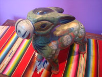 Mexican vintage pottery and ceramics, a wonderful burnished pottery donkey with fine artwork decorations, Tonala, Jalisco, c. 1940's.  Side view showing the donkey's face.