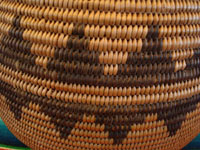 Closeup photo of Native American Indian basket, Chemehuevi olla c. 1910.