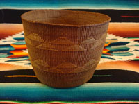 J-3: Native American Indian basket, Tlingit gift basket with two geometric bands of decoration, c. 1900. Condition is mint! The weave is exceptionally tight and beautiful. Size: 4" tall x 5" diameter at mouth. Price: $675. 
