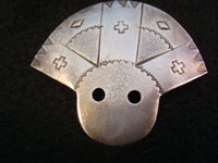 Native American Indian vintage silver jewelry, a Navajo silver pin depicting the Apache Spirit Warrior, c. 1960.
