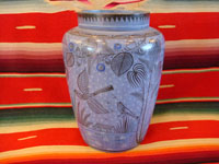 I-3: Mexican vintage pottery and ceramics, a burnished vase from Tonala, Jalisco, c. 1940. Beautifully decorated with hand-painted floral designs and birds. Pale blue background with stars. This one is really special! Size: 8" tall x 6" across at shoulder of vase. Price: $325.
