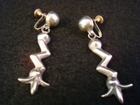  Mexican vintage sterling silver jewelry, earrings with "corn pattern", c. 1940's. Size: 2 1/4" tall x 3/8" wide at top. Marked: BGM Hecho en Mexico DF 925. These are very graceful and have wonderful age and patina. Price: $175.