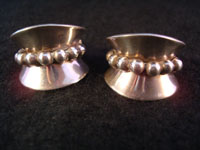 I-5: Mexican vintage Taxco sterling silver jewelry, earrings with bump-out ball design, c. 1940. Signed "Taxco Sterling". Extremely elegant and wonderful craftsmanship. Size: 1" wide x 3/4" high. Price: $155.