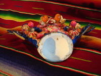 Mexican vintage pottery and ceramics, a wonderful and brightly decorated tree of life from Izucar de Matamoros, c. 1950's.  A photo showing the bottom of the tree of life.