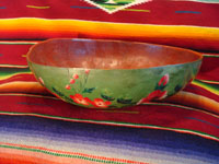 Mexican vintage folk art, a laquer-ware painted bowl, created from a gourd, from Chiapa de Curso, Chiapas, c. 1930. Another photo showing the side of the bowl.