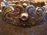 Mexican vintage sterling silver jewelry, and Taxco vintage silver jewelry, a beautiful sterling silver bracelet with an elegant and wonderful design, stamped on the back with the signature of the famous artist, Hector Aguilar, Taxco, c. 1940's.  Closeup photo of a part of the Taxco silver braceley by Hector Aguilar.