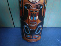 Native American Indian folk art and woodcarvings, a beautiful Northwest Coast large totem pole or house post, Haida, Queen Charlotte Islands, c. 1940's. Photo of the images near the bottom of the pole, an eagle and what is perhaps a beaver.