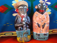 Mexican vintage folk art, and Mexican vintage pottery and ceramics, a wonderful pair of pottery bottles in the form of whimsical and colorful "monos" or monkeys, Oaxaca, c. 1950's. Main photo of the bottles.