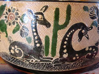 Closeup photo of the second side of the petatillo pottery casserole with lid.