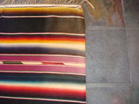 A closeup photo of another part of the vintage Mexican textile, a Saltillo sarape.