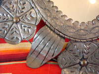 Mexican vintage tin-work, a second closeup photo of the tin-work mirror.