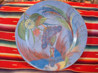 Mexican vintage pottery and folk-art, a beautiful burnished charger with a wonderful bird and floral design, blue background, Tonala, c. 1930's.  Main photo of charger.