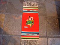 Mexican vintage textiles and Saltillo sarapes, a wonderful pair of matching Saltillo sarapes featuring a dashing Mexican charro (horseman) and a lovely China Poblana or charra dancing around a sombrero, c. 1940's. Main photo of the China Poblana or Charra.