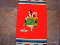 Mexican vintage textiles and Saltillo sarapes, a wonderful pair of matching Saltillo sarapes featuring a dashing Mexican charro (horseman) and a lovely China Poblana or charra dancing around a sombrero, c. 1940's. Closeup photo of the Charra.