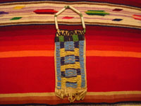 Native American Indian antique beadwork and folk-art, a Lakota (Sioux) beaded ration-pouch, c. 1890-1900. The beadwork on the pouch is very fine, and the pouch has a handle of lovely glass beads. Main photo of Lakota beadwork pouch.