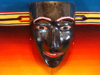 Mexican vintage woodcarvings and masks, and Mexican vintage folk art, a wonderful carved and painted wooden "Mask of the Negrito (Negro)", used in the dance in winter in San Lorenzo, Michoacan, c. 1950.  Main photo of the mask.