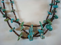 Native American Indian vintage jewelry, and Navajo vintage jewelry, a lovely three-strand necklace of turquoise and heishi, Arizona or New Mexico, c. 1950's. Closeup photo of a part of the necklace.
