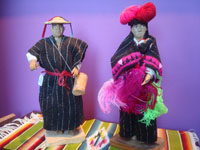 Mexican vintage folk art, a pair of wood-carved dolls depicting an indigenous couple, Chiapas, c. 1980's.  Main photo of the dolls.