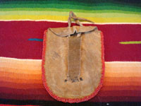 Native American Indian antique beadwork and folk art, a finely beaded belt-pouch, Cree, c. 1910-20. The beadwork is very fine and coloful, and condition is excellent given the age of the piece. Photo of the back side of pouch.