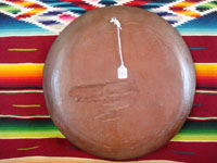 Mexican vintage wood-carving and folk art, a hand-carved laquer-ware batea with wonderful artwork, Uruapan, Michoacan, c. 1930's. The batea features lovely floral decorations, painted on top of the fine laquer finish.  Photo of the back side of the wooden batea.