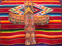 Native American Indian antique folk art, a wood-carved totem pole from the Pacific Northwest, Squamish, c. 1950. The totem pole features a wonderful eagle at the top, a transformation figure, and a beautiful bear. Main photo of totem pole.