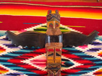Native American Indian woodcarving and folk art, a lovely totem pole from the Pacific Northwest, c. 1940. The pole is carved from cedar and depicts an eagle and bear. Photo showing the eagle at the top of the totem pole.