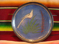 Mexican vintage pottery and ceramics, a lovely burnished plate with a beautiful blue background and wonderful artwork, Tonala or Tlaquepaque, Jalisco, c. 1930's. The artwork features a graceful bird and flowers.  Main photo.