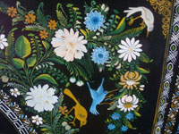 Mexican vintage woodcarvings and masks, and Mexican vintage folk art, a large laquerware wooden tray with very fine and detailed artwork, Olinala, c. 1940. Closeup photo of the birds and flowers on the tray.