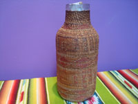 Native American Indian antique baskets, a Tlingit hand-blown glass bottle with wonderful weaving around it, c. 1900. Main photo of the basketry bottle.