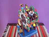 Mexican vintage folk art, and Mexican vintage pottery and ceramics, a wonderful pottery ferris wheel filled with happy people and very colorful decorations, Ocumicho, Michoacan, c. 1980's. Main photo of the ferris wheel.