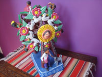 Mexican vintage folk art, and Mexican vintage pottery and ceramics, a wonderful pottery ferris wheel filled with happy people and very colorful decorations, Ocumicho, Michoacan, c. 1980's. A view of the second side of the ferris wheel.