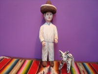 Mexican vintage folk art and woodcarving, a wonderful woodcarving of a Mexican paisano by the master carver Manuel Jimenez of Oaxaca, c. 1950's.  Main photo of the man.