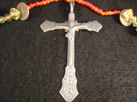 Mexican vintage silver jewelry, a Mexican or Guatemalan silver cross, c. 17th-18th century. This is a colonial era devotional cross showing significant indigenous, pre-hispanic influence. Another closeup photo of the cross.