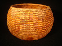 Native American Indian antique basket, Mission basket with original sales tag, 1918. Very finely woven Mission basket with the original sales tag from c. 1918. Various shades of juncus on a deer grass bundle; very tightly coiled. The original sales tag identifies this basket as from the Saboba Reservation, Riverside, California, 1918. The other side of the tag identifies the basket as coming from a Marvin Whitaker of Portland, Oregon, the dealer or original collector. Condition is excellent. Main photo.