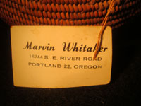 Native American Indian antique basket, Mission basket with original sales tag, 1918. Very finely woven Mission basket with the original sales tag from c. 1918. Various shades of juncus on a deer grass bundle; very tightly coiled. The original sales tag identifies this basket as from the Saboba Reservation, Riverside, California, 1918. The other side of the tag identifies the basket as coming from a Marvin Whitaker of Portland, Oregon, the dealer or original collector. Condition is excellent. Photo of the second side of the original sales tag of this Mission Indian basket.
