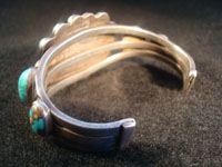 Native American Indian vintage silver jewelry, a Navajo sterling silver bracelet with wonderful natural turquoise stones, c. 1920; ingot silver. The turquoise is about the most beautiful you will ever see!  Photo of back of bracelet.