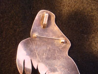 Native American Indian vintage silver jewelry, a Northwest Coast pendant and broach depicting a wonderful eagle in flight, c. 1980.  Photo of back side of broach.