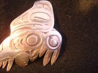 Native American Indian vintage silver jewelry, a Northwest Coast pendant and broach depicting a wonderful eagle in flight, c. 1980.  A closeup photo of the broach and pendant.