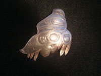 Native American Indian vintage silver jewelry, a Northwest Coast pendant and broach depicting a wonderful eagle in flight, c. 1980.  Main photo of silver eagle.